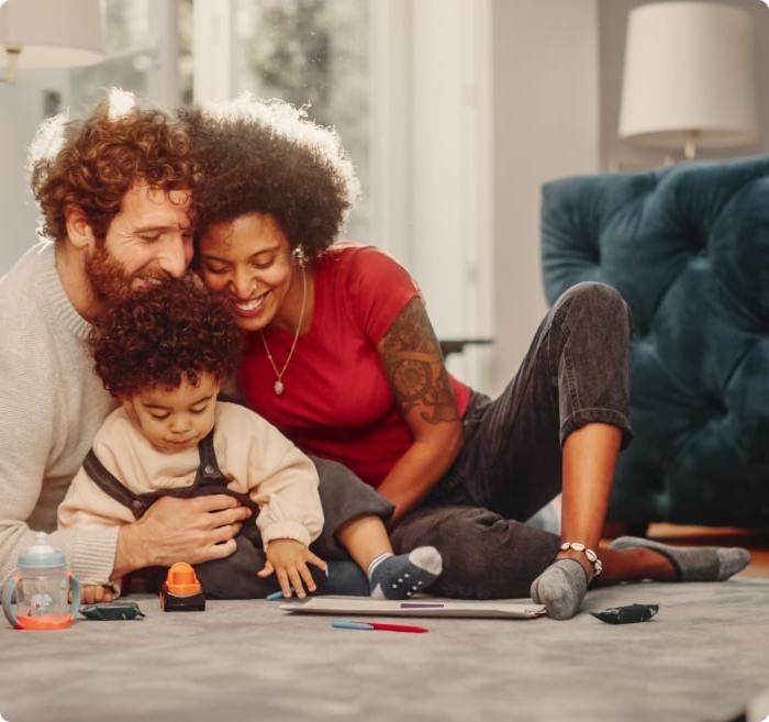 Mother and father playing with a child